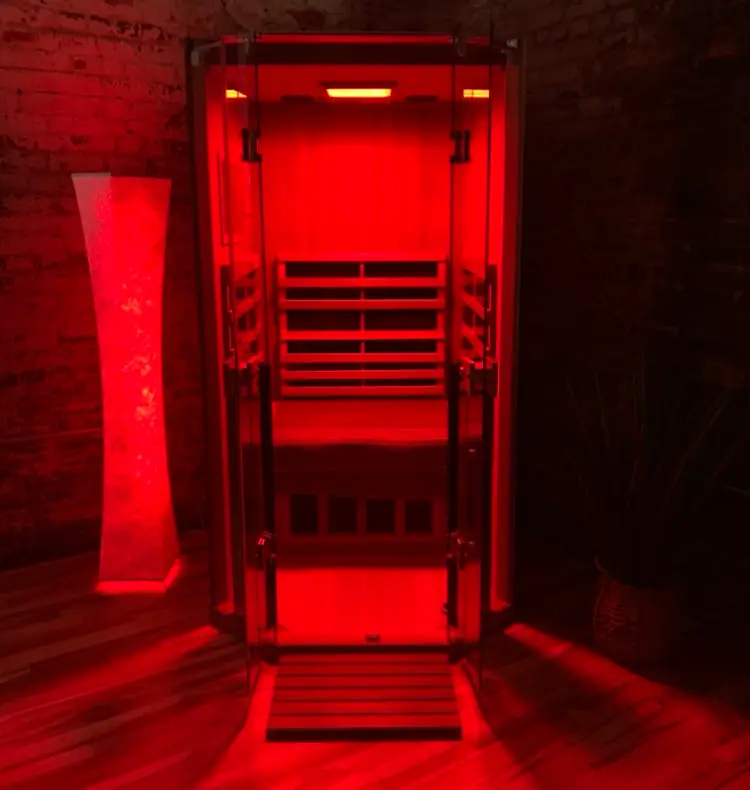 Infrared sauna with warm red lighting